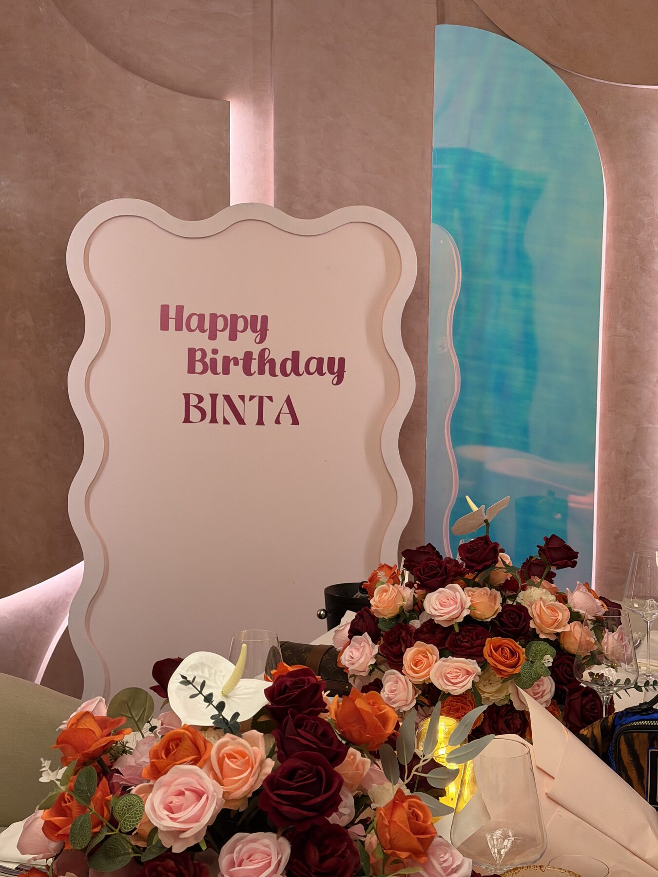 Happy Birthday signage styled with fresh florals