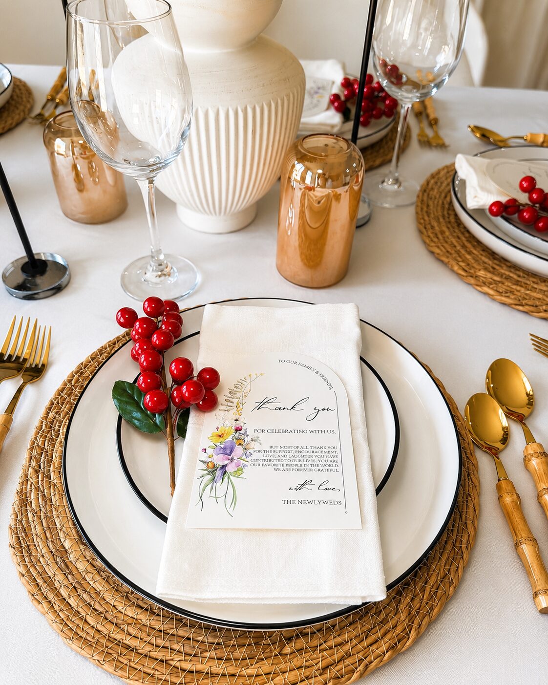 Place setting detail with berries and thank you card